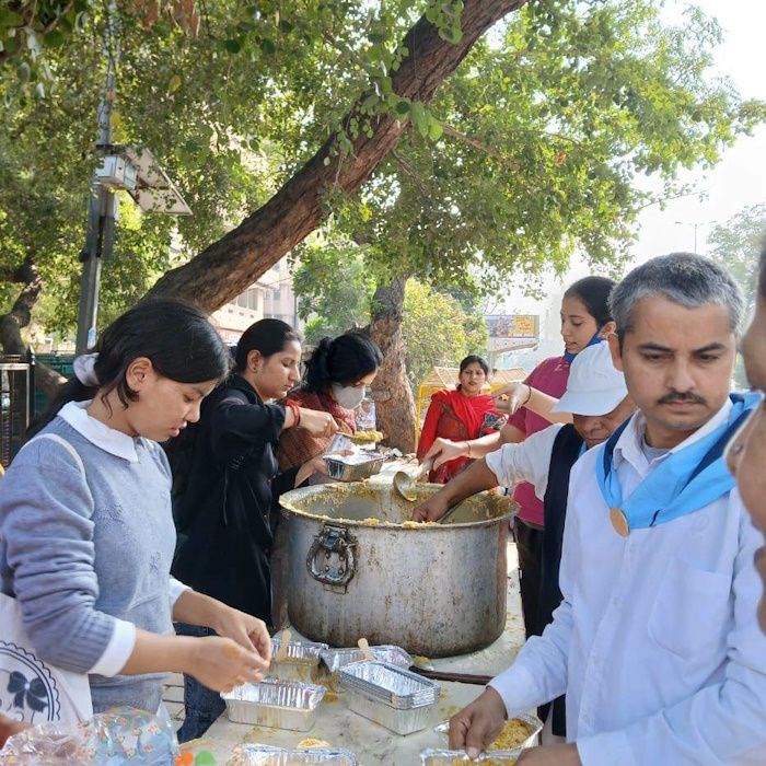 Performing Narayan Seva- Serving food to the Poor